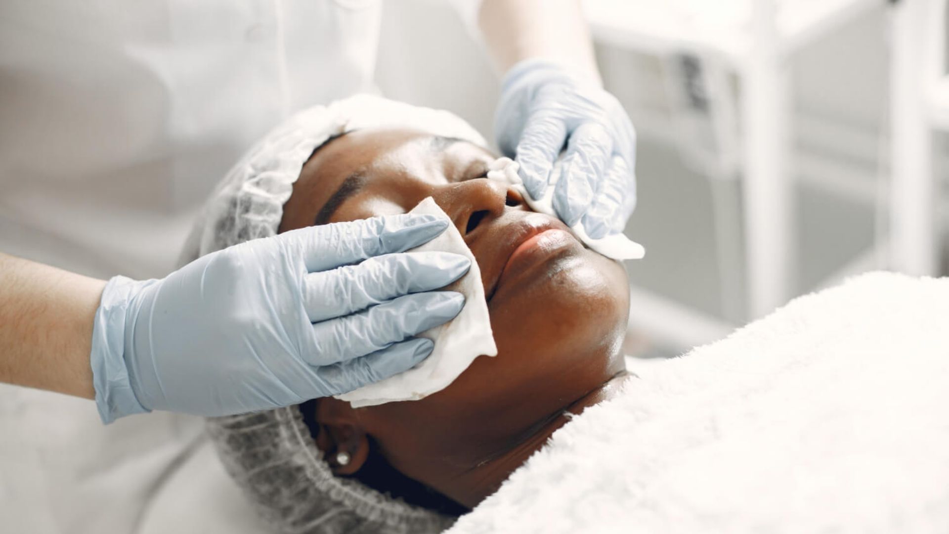 skin rejuvenation that looks medical, calm and professional black doctor - 1080