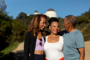 healthy family smiling at each other